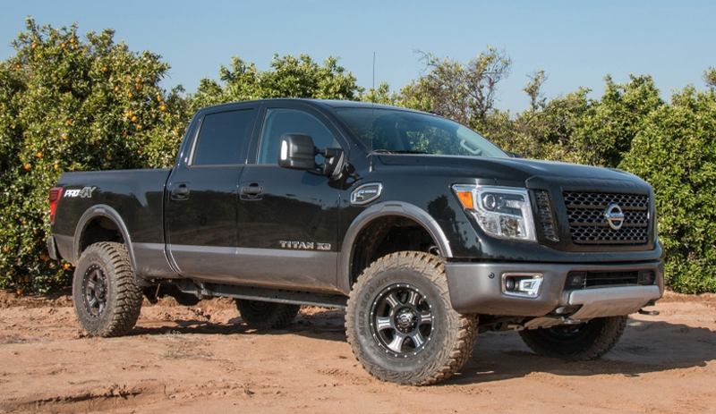 Say what you will about F-150eqsue styling, the Titan XD looks good on these wheels. (Image: ICON Vehicle Dynamics)